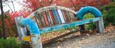 Old and colored bench in a park