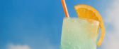 Refreshing ice juice with orange - summer cold drink