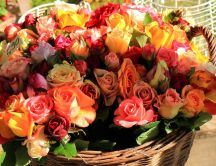 A stunning basket with colorful roses