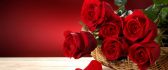 Beautiful red roses bouquet in a basket