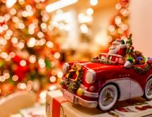 Santa is coming with a beautiful red car - Merry Christmas