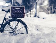 Bike buried in snow - beautiful winter season