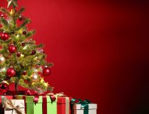 Christmas tree and gift boxes - Red background