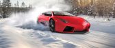 Red Lamborghini drift in the snow - White winter season