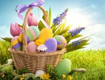 Wonderful Easter basket full with coloured eggs -Spring time
