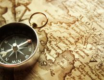 Voyage around the world - Old map and compass