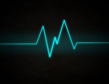 Blue heart line on a dark background