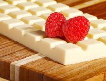 Delicious raspberry and a piece of white chocolate