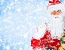 Santa Claus with Christmas tree - Winter season holiday