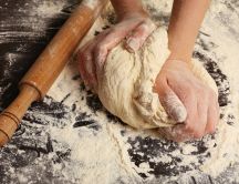 The process for making a delicious bread -Flour on the table