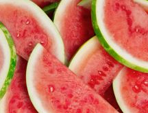Fresh and cold slices of watermelon fruit - Hot summer day