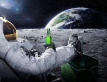 Astronaut drinking beer on the moon
