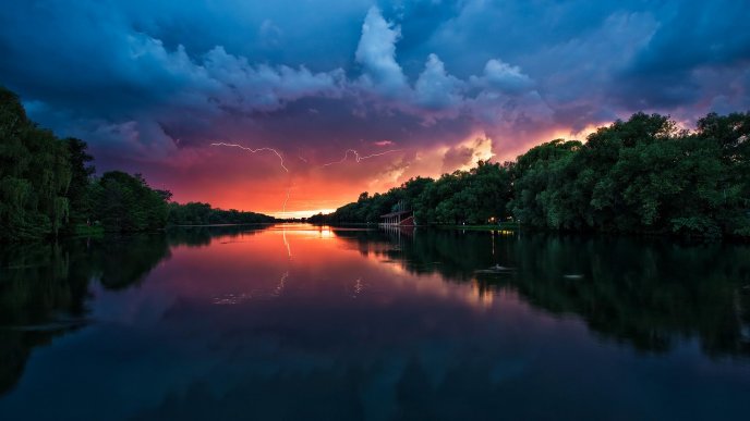 Sunset storm over the river