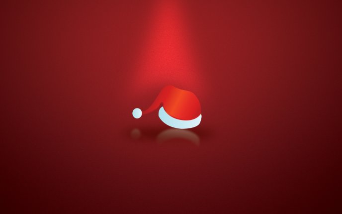 Small Christmas hat in the light HD wallpaper