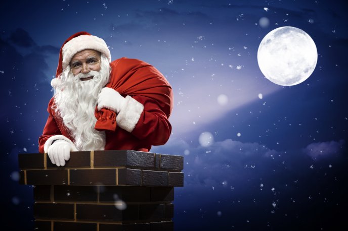 Santa Claus comes down the chimney at midnight
