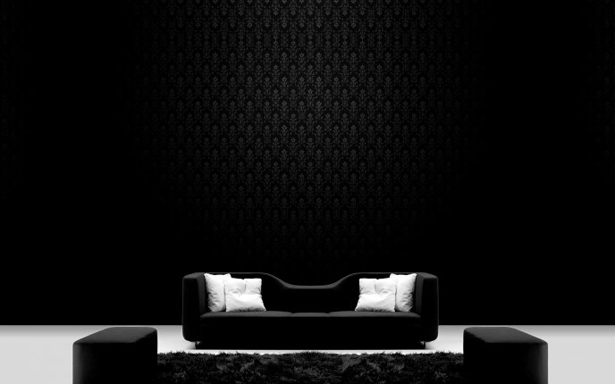 Black sofa on a dark room HD wallpaper