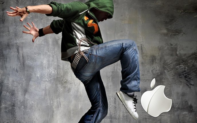 Playing football with the Apple logo - art design
