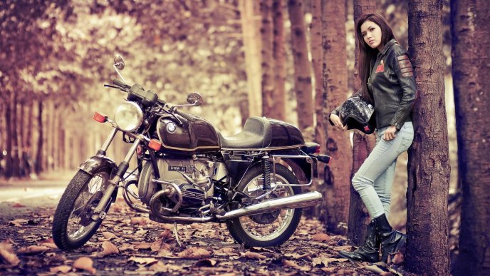 Girl with the motorcycle in the forest - photo shoot
