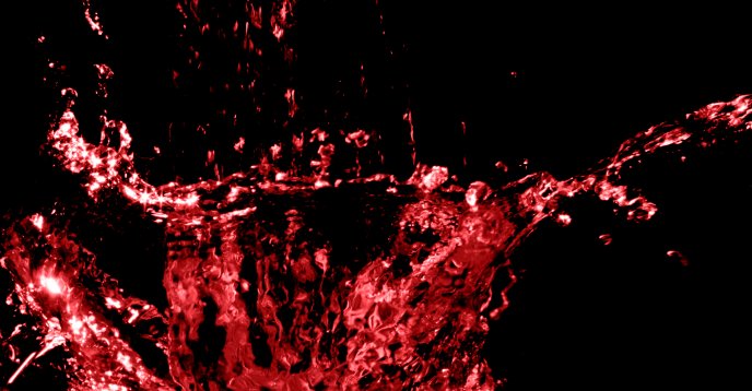 Abstract red splash on a dark background