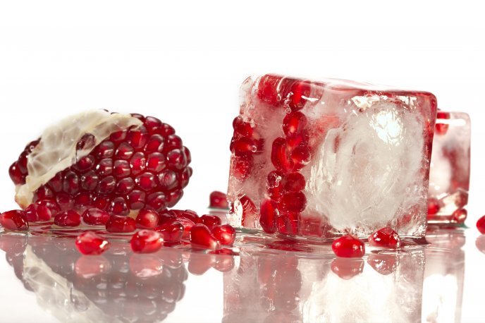 Pomegranate beans in an ice cube
