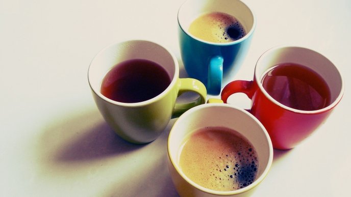Four delicious cups of tea and coffee - good morning