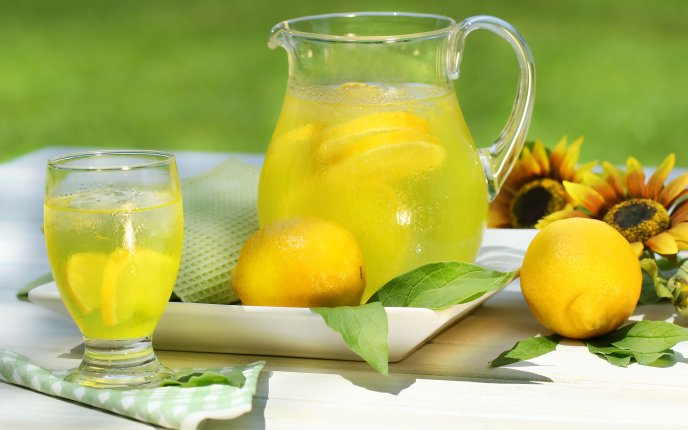 Fresh lemonade in the hot summer days - delicious drink