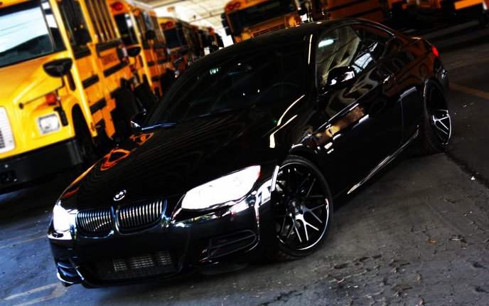 Shiny black car - BMW E92 335i - high speed