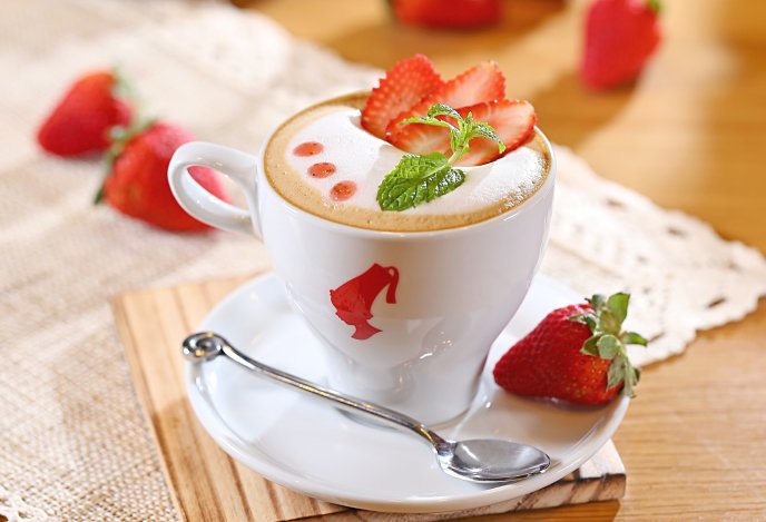 Fresh summer coffee with strawberry and mint