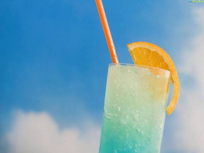 Refreshing ice juice with orange - summer cold drink