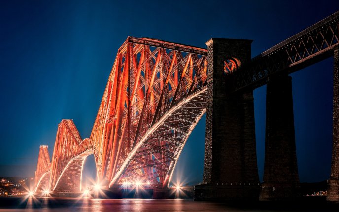The Forth Bridge Edinburgh lit in the night