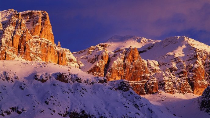 Snow on the Sella Group mountains from Italy