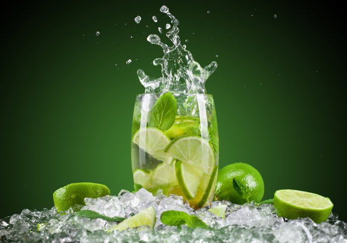 Splash - lime slice and mint in a glass of water