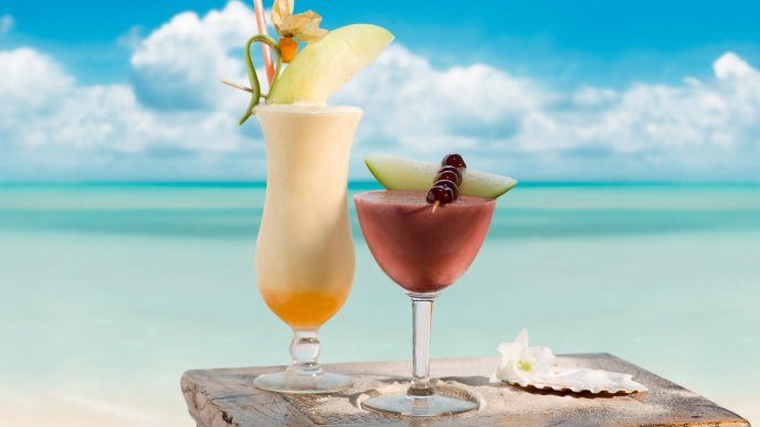 Fresh cocktails on the beach - summer holiday