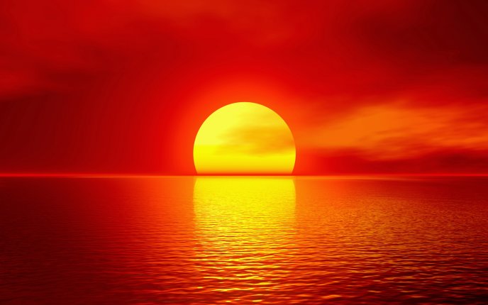 Big golden ball - summer sunset over the ocean