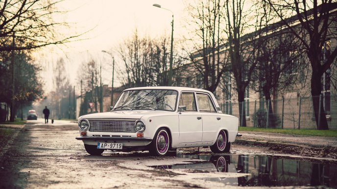 White old car - Lada on the road