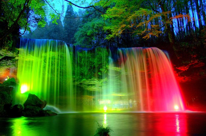 Wonderful colorful lights on the waterfall - HD natural park