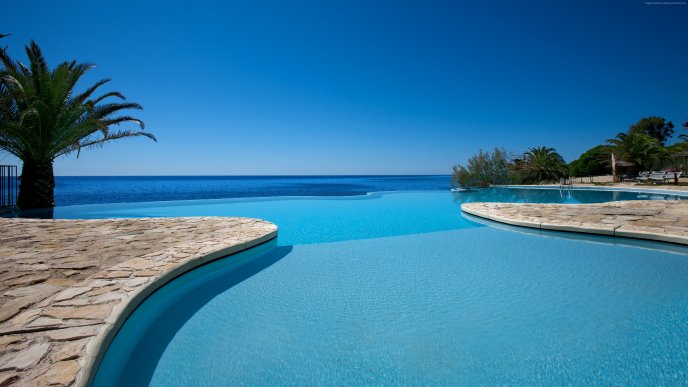Wonderful infinity pool in Sardinia Italy - Summer time