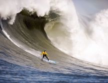 Doing surf on a big wave