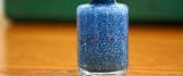 Blue glitter nail polish