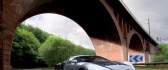 Beautiful car - Bugatti Veyron passing under a bridge