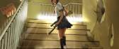 Anime - angry girl with a rifle on the stairs