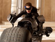 Catwoman on a huge dark bike - The dark knight rises movie