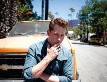 Josh Dallas smoking and his car - Chevrolet