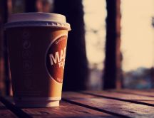 Coffee in a paper cup close up HD wallpaper
