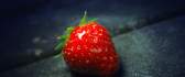 Delicious fruit - strawberry on the road HD wallpaper