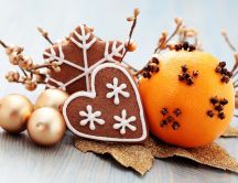 Decorated orange and Christmas cookies in a lovely setting