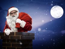 Santa Claus comes down the chimney at midnight