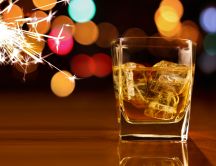 Ice cubes in a glass of whiskey HD wallpaper