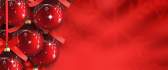 Red Christmas ornaments on a red background HD wallpaper