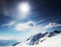 Sunshine through the clouds - winter landscape